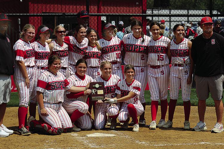 DISTRICT CHAMPIONS! All smiles after two solid District Tournament wins last week were members of the Soper Lady Red Bear Softball team. They include (back, l-r) Coach Clay Mack, Kirsten Harless, Morgan Harless, Makayla Carriger, Shyanne Wolfe, Coach Mark Hammock, Brailee Drake, Aubrey Harless, Kobi Rice, Alexis Hill, Alexa Rouse and Coach Brandon Debo, (front, Seniors, l-r) Raili Beal, Alexis Moore, Jaylee Campbell and Josie Gardner. Photo Courtesy Brian Moore