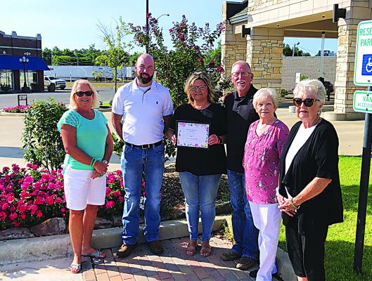 The Iris Garden Club presented a special recognition beautification award to Security Bank recently for their new bank and beautiful landscaping. Pictured are (l to r): Harolynn Wofford, Michael Melton, Dusty Hicks, Shane Spillman, Mary Cook and Sammye Thacker.