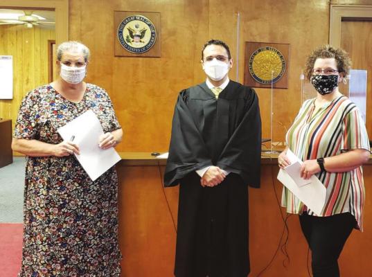 District Judge Bill Baze performed the swearing in of Choctaw County Clerk Emily VanWorth (left) and Choctaw Court Clerk Laura Sumner (right) Monday morning. VanWorth is on her eighth term and Sumner is on her third. Contributed Photo