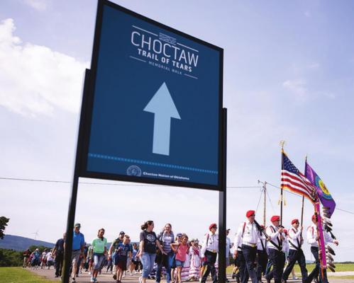 With the Choctaw Nation of Oklahoma Color Guard leading the way, an estimated 700 people join the 2021 Trail of Tears Memorial Walk Saturday, May 15 at Tvshka Homma. Photo Courtesy / Chris Jennings, Choctaw Nation