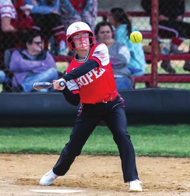 JAYLEE CAMPBELL carefully watches a pitch as the Soper Lady Bears battle the Crowder Lady Demonettes last week on their home field. Jaylee scored a run for Soper in the second inning as Soper posted a solid 11-3 victory.