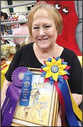 Joanne Cooper, of Sawyer, won Best of Show, Grand Champion, and First place for her oil painting entered in the Choctaw County Free Fair.