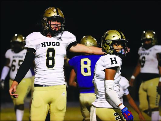 BUFFALO DEFENDER HUNTER SIMS questions an official following one of Heavener’s touchdowns Thursday. The Buffaloes allowed 39 points but put up 62 of their own to hold third place in District 2A-6 standings. Hugo News Photo/ KELLI STACY