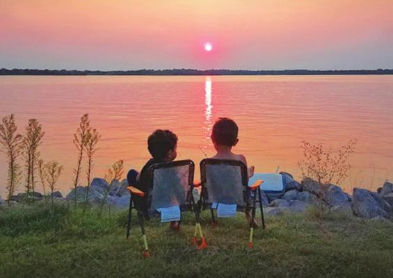 Oklahoma’s Free Fishing Days is the perfect chance to show someone the joys of fishing for the first time. No state fishing llicense is required. (Joshua Denham/2018 Readers’ Photo Showcase)