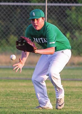 NOAH COOPER hustles in front of a hard-hit ball to his right field position for the Rattan Rams in recent baseball action at Choctaw Nation Warrior Stadium in Grant. Hugo News Photo / Bobby Hamill