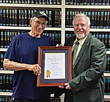 Choctaw County Bar President J. Frank Wolf, III, presents Attorney Hack Welch with his 50 year plaque and pin for recognition of his fine services to Southeast Oklahoma. Contributed Photo