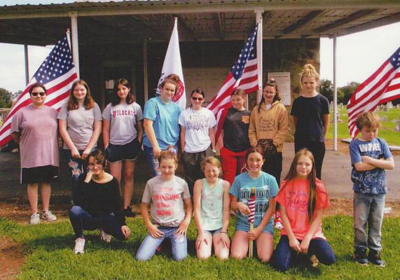 Memorial Day at the Fort Towson Cemetery included: Front (l to r): Samantha Scott, Payton Burchfield, Haley George, Jailynn George, Danielle Brents and AJ Brents. Back (l to r): Stacey Scott, Bethany Walkup, Jaleigh Loper, McKayla Brents, Jayln Broadrick, Madison Burchfield, Jesslyn Broadrick, Mackenzie Brown.