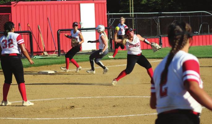 JOCELYN RICE fields an infield hit and turns to make the throw to second, while her teammates are moving in several different directions. Also pictured are Chloeaunna Madbull, Shy’Anne Wolfe, Sadie Rice, and Jaylee Campbell. (Brian Moore Photo)