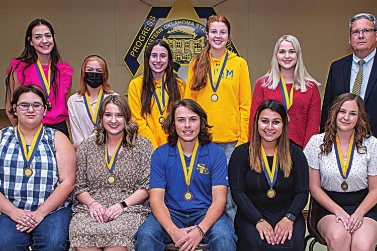 Above left: Southeastern president Thomas Newsom joined the Top 10 Freshman Award recipients for a group photo. Front row, left to right: Madison Saunders, Chloe Miller, Mason Phillips, Emma Quintana, and Alaura Gilmore. Back row: Rachel Goade, Dottie Fuhr, Maci Bookout, Lauren Beason, and Faith Isenberg.