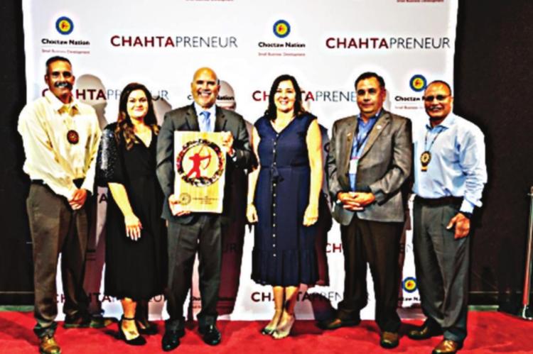 From left to right: Assistant Chief Jack Austin Jr.; Brittany Rice, Choctaw Nation Small Business Advisor; Choctaw Nation Chahtapreneur of the Year, Carl Brown; Angie Brown; Jess Henry, Choctaw Nation Tribal Council Member and Chief Gary Batton.