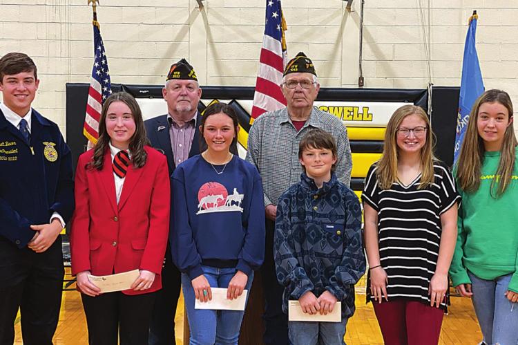VETERANS ESSAY WINNERS are (pictured left to right): Voice of Democracy (High School): Garrett Bacon second place; Kansas West first place; Morgan Harless third place. Patriot’s Pen (Junior High): Case Smallwood third place; Bella Manous first place; Kaydence West second place. Also pictured are Boswell VFW members