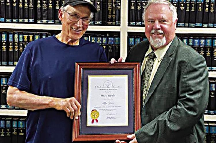Choctaw County Bar President J. Frank Wolf, III, presents Attorney Hack Welch with his 50 year plaque and pin for recognition of his fine services to Southeast Oklahoma. Contributed Photo