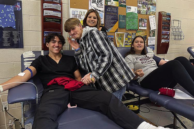 Hugo High School students donate at OBI Blood Drive hosted by the Leo Club on Sept. 7 at Hugo High. Pictured are: Zion Siniga, Chad Barnett, Riley Janoe and Sophia Bobb.