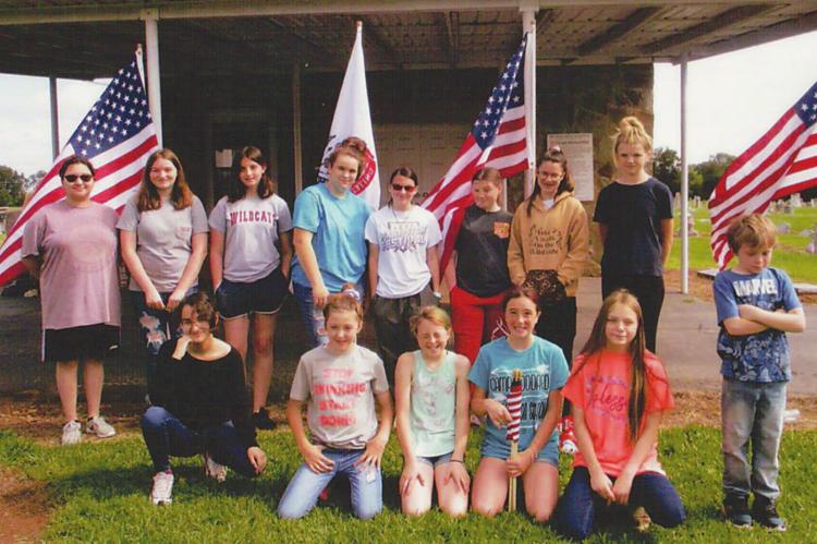 Memorial Day at the Fort Towson Cemetery included: Front (l to r): Samantha Scott, Payton Burchfield, Haley George, Jailynn George, Danielle Brents and AJ Brents. Back (l to r): Stacey Scott, Bethany Walkup, Jaleigh Loper, McKayla Brents, Jayln Broadrick, Madison Burchfield, Jesslyn Broadrick, Mackenzie Brown.